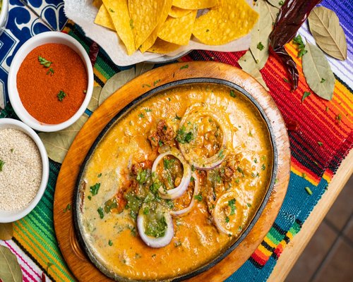Traditional Mexican homemade food with tortillas and frijoles